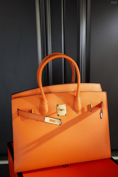 Hermes brikin orange handbag